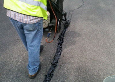 crack fill repair on paved asphalt