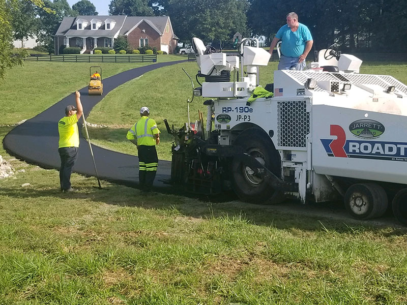 Working providing traditional asphalt patching